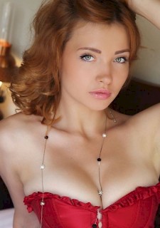 redhead girl in corset