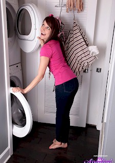 Hot teen Andi Land gets naked on laundry