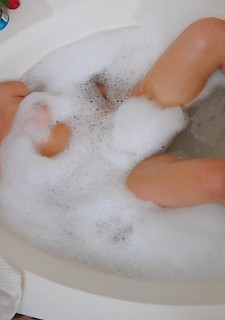 teenage latina babe shows nice ass while having a bath