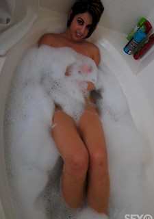 teenage latina babe shows nice ass while having a bath