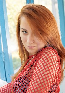 Redhead sexy babe Masya A gets nude just for you
