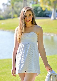 sexy Lacey lifts her white dress outdoor