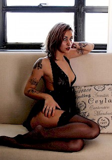 sexy Ashlee Nova teases in her black stockings