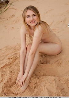 horny model Lia Kate strips naked outside in her debut set