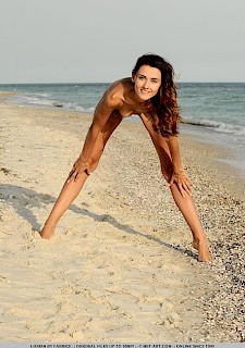 hot Lorian spreads her legs on the beach