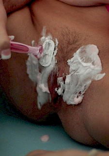sexy Mia Malkova shaving and masturbating in the bathroom